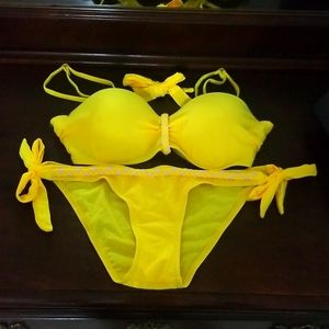 Small Yellow two piece bikini bathing suit set with braided accent. Never worn